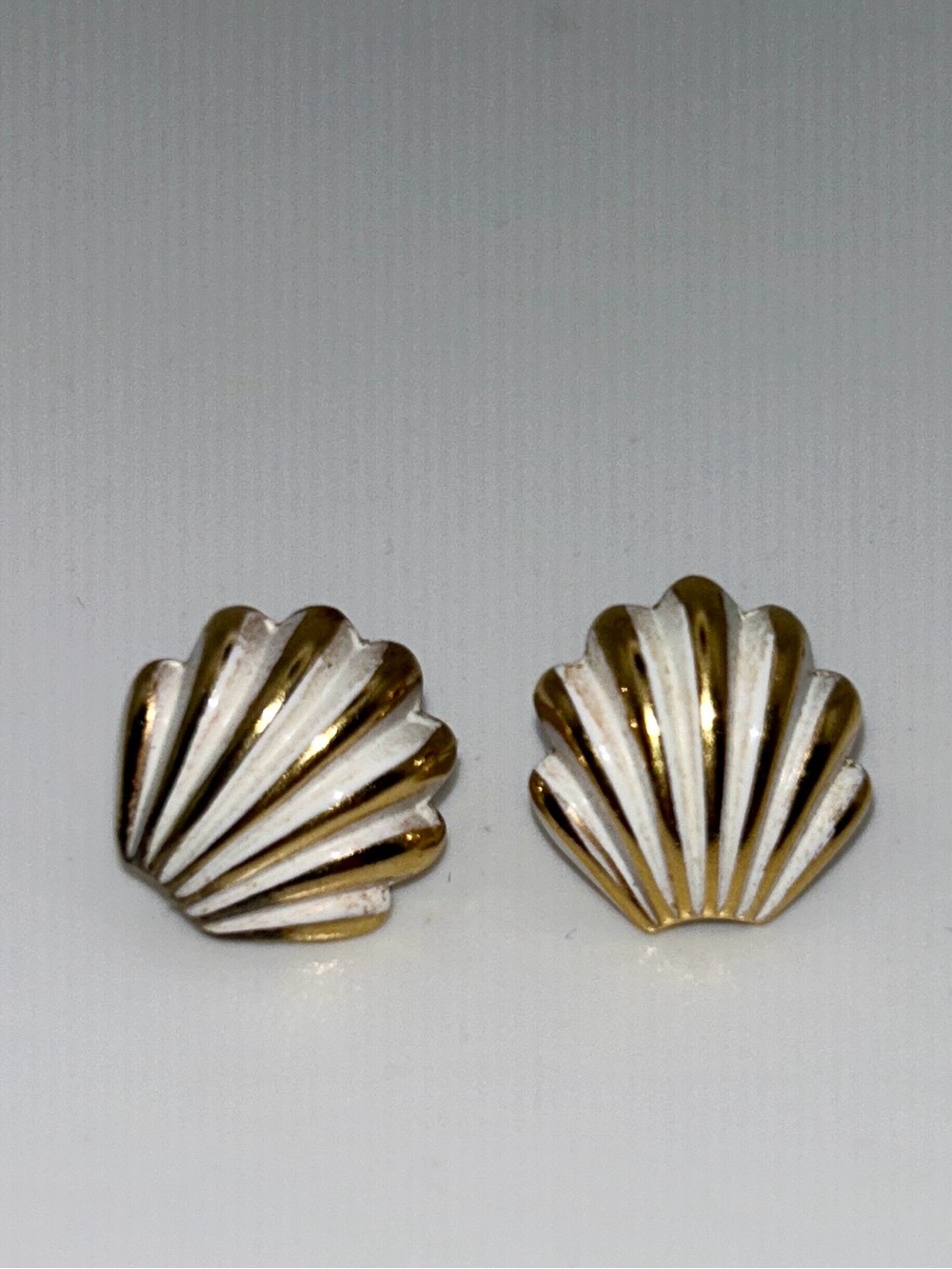 Vintage Napier gold tone with white detail shell design.
